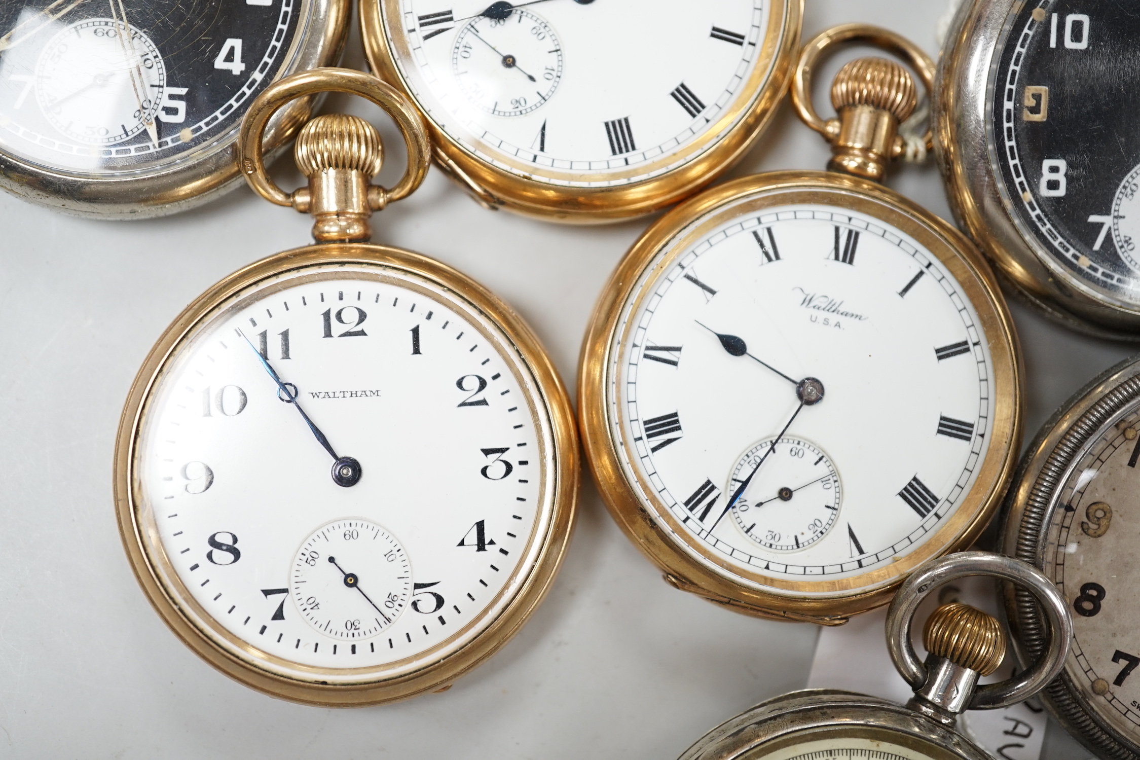 Eleven assorted gold plated or base metal pocket watches including three Waltham and Doxa military black dial.